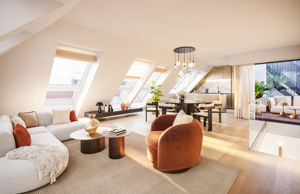 Helles Dachgeschoss-Wohnzimmer mit Couch, Essbereich und Schrägfenstern.
